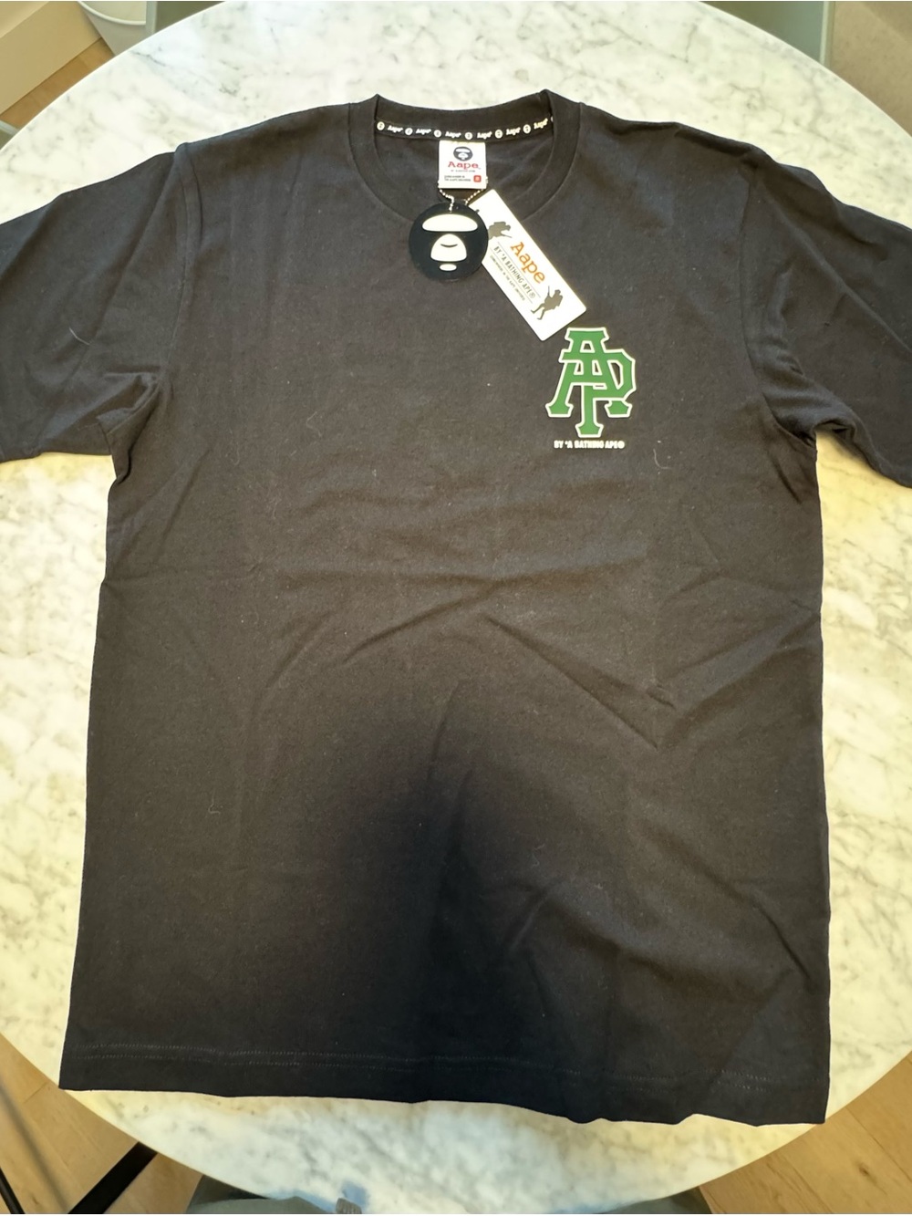 AAPE Black Short Sleeve Tee with Green Chest Logo - Men's